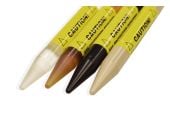 Small PDR KnockDown 4-piece set — close-up of four sharp-tip knockdowns (clear acrylic, brown Ultem, black Delrin, tan PEEK) with yellow caution stickers.