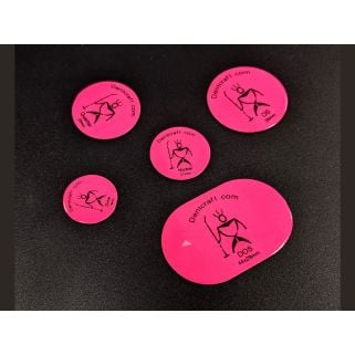 Five hot pink dent size magnets labeled Dime (18 mm), Nickel (21 mm), Quarter (25 mm), OS (29 mm), and DOS (44×29 mm) arranged on a black background.