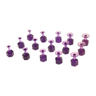Fifteen purple Dent Reaper Dead Center hexagonal glue tabs in mixed sizes from 8 mm to 16 mm arranged on a white background.